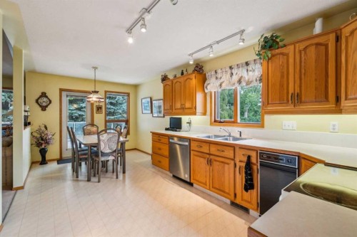 2506 19 Street, Nanton, AB - Indoor Photo Showing Kitchen With Double Sink