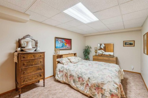 2506 19 Street, Nanton, AB - Indoor Photo Showing Bedroom