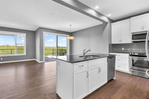 263 Chaparral Valley Way Se, Calgary, AB - Indoor Photo Showing Kitchen With Double Sink With Upgraded Kitchen
