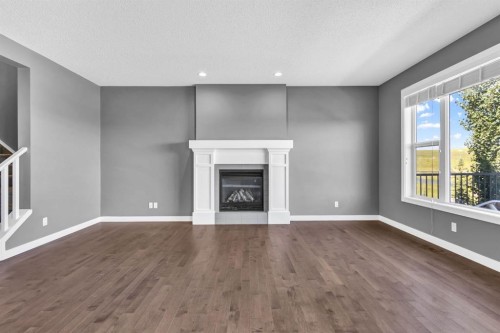263 Chaparral Valley Way Se, Calgary, AB - Indoor Photo Showing Living Room With Fireplace