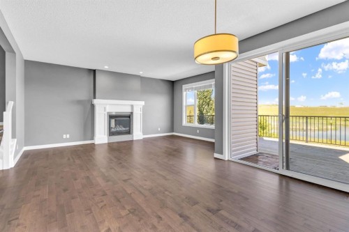 263 Chaparral Valley Way Se, Calgary, AB - Indoor Photo Showing Living Room With Fireplace