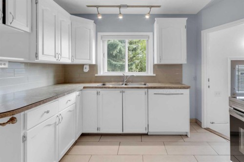 2412 22 Street Nw, Calgary, AB - Indoor Photo Showing Kitchen With Double Sink