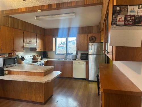 5119 51 Ave, Caroline, AB - Indoor Photo Showing Kitchen With Double Sink