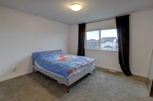 20 Nolancrest Green Nw, Calgary, AB - Indoor Photo Showing Bedroom