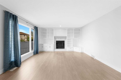 30 Hidden Circle Nw, Calgary, AB - Indoor With Fireplace