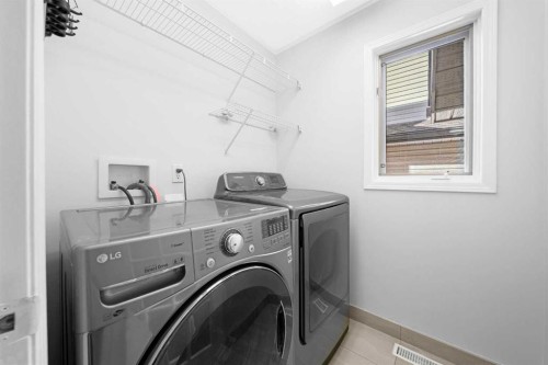 30 Hidden Circle Nw, Calgary, AB - Indoor Photo Showing Laundry Room
