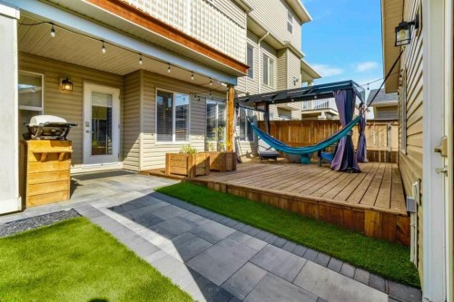 288 Rainbow Falls Green, Chestermere, AB - Outdoor With Deck Patio Veranda