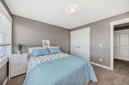 288 Rainbow Falls Green, Chestermere, AB - Indoor Photo Showing Bedroom
