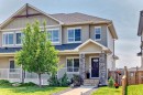 288 Rainbow Falls Green, Chestermere, AB  - Outdoor With Deck Patio Veranda With Facade 