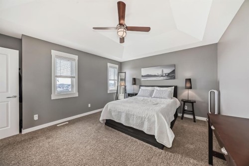288 Rainbow Falls Green, Chestermere, AB - Indoor Photo Showing Bedroom