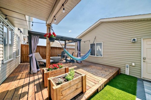 288 Rainbow Falls Green, Chestermere, AB - Outdoor With Deck Patio Veranda With Exterior