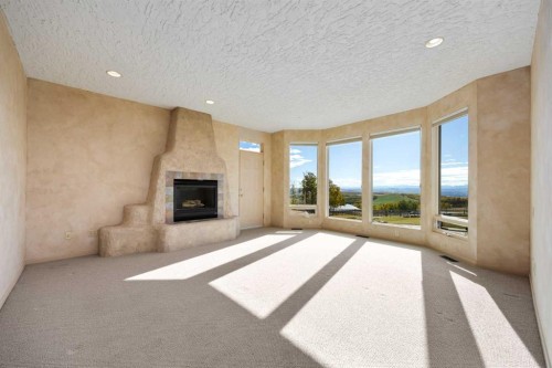 290254 96 Street West, Rural Foothills County, AB - Indoor With Fireplace