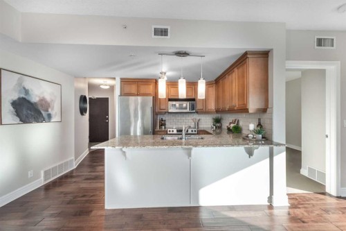 1807-920 5 Avenue Sw, Calgary, AB - Indoor Photo Showing Kitchen With Stainless Steel Kitchen With Upgraded Kitchen