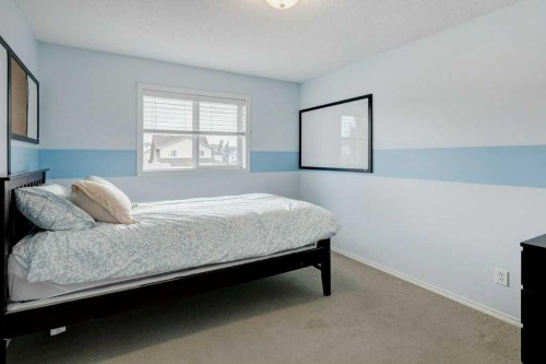 14 Everglen Manor Sw, Calgary, AB - Indoor Photo Showing Bedroom