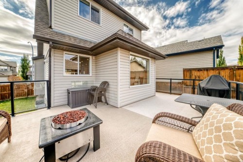 182 Sunset Heights, Cochrane, AB - Outdoor With Deck Patio Veranda With Exterior