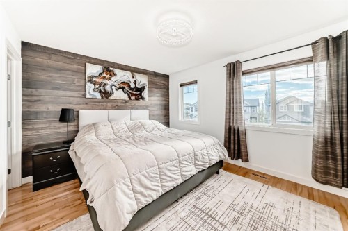 182 Sunset Heights, Cochrane, AB - Indoor Photo Showing Bedroom