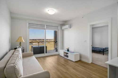 2406-200 Seton Circle Se, Calgary, AB - Indoor Photo Showing Living Room