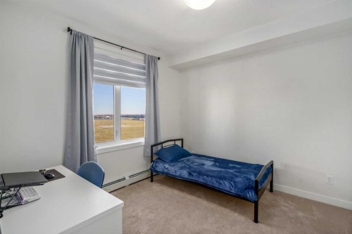 2406-200 Seton Circle Se, Calgary, AB - Indoor Photo Showing Bedroom