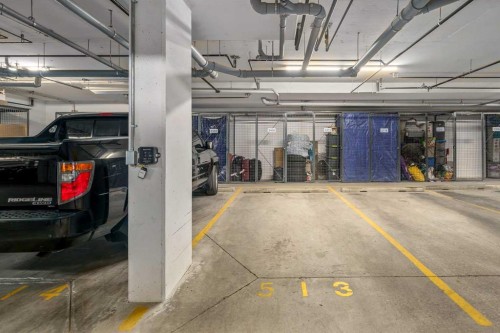 2406-200 Seton Circle Se, Calgary, AB - Indoor Photo Showing Garage