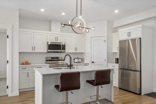 2406-200 Seton Circle Se, Calgary, AB - Indoor Photo Showing Kitchen With Upgraded Kitchen