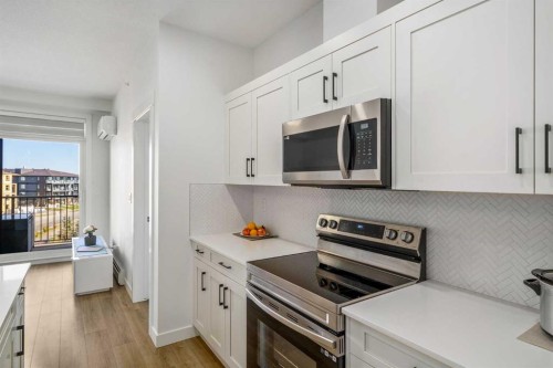 2406-200 Seton Circle Se, Calgary, AB - Indoor Photo Showing Kitchen With Upgraded Kitchen