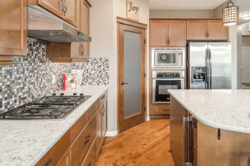 105 Aspen Stone Road Sw, Calgary, AB - Indoor Photo Showing Kitchen With Stainless Steel Kitchen With Upgraded Kitchen