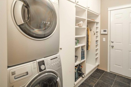 105 Aspen Stone Road Sw, Calgary, AB - Indoor Photo Showing Laundry Room