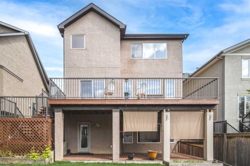 105 Aspen Stone Road Sw, Calgary, AB - Outdoor With Deck Patio Veranda With Exterior