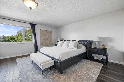 52 West Edge Road, Cochrane, AB - Indoor Photo Showing Bedroom