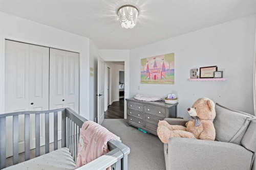 52 West Edge Road, Cochrane, AB - Indoor Photo Showing Bedroom