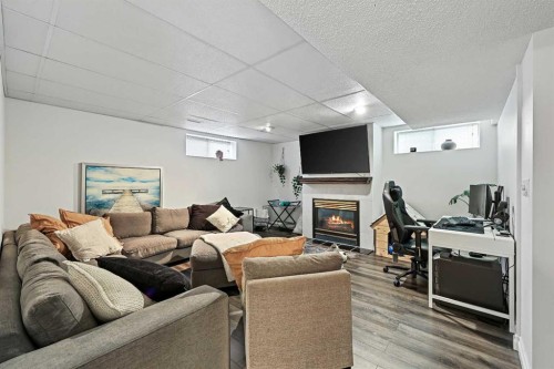 52 West Edge Road, Cochrane, AB - Indoor With Fireplace