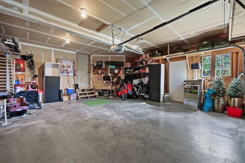 52 West Edge Road, Cochrane, AB - Indoor Photo Showing Garage