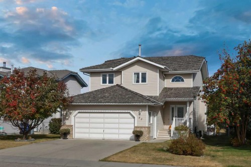 52 West Edge Road, Cochrane, AB - Outdoor With Facade