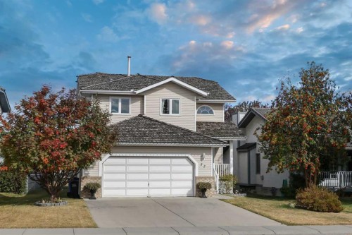 52 West Edge Road, Cochrane, AB - Outdoor With Facade