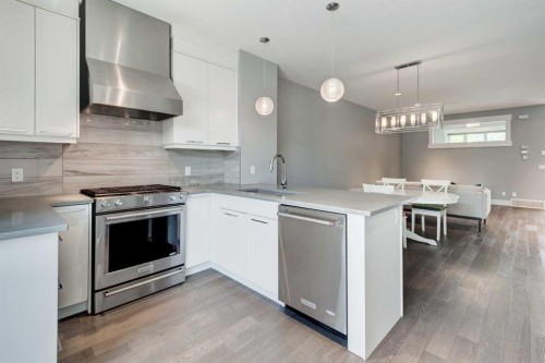 112 Burma Star Road Sw, Calgary, AB - Indoor Photo Showing Kitchen With Stainless Steel Kitchen With Upgraded Kitchen
