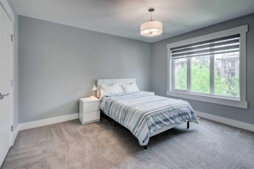 112 Burma Star Road Sw, Calgary, AB - Indoor Photo Showing Bedroom