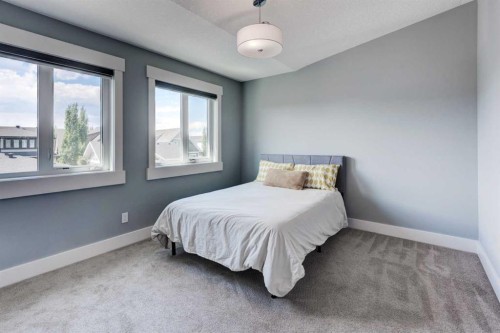 112 Burma Star Road Sw, Calgary, AB - Indoor Photo Showing Bedroom