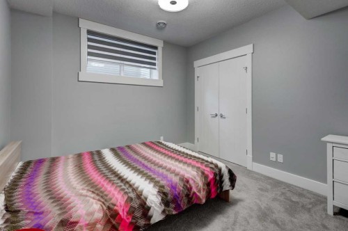 112 Burma Star Road Sw, Calgary, AB - Indoor Photo Showing Bedroom