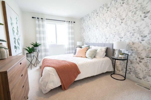 31 Heritage Heath, Cochrane, AB - Indoor Photo Showing Bedroom