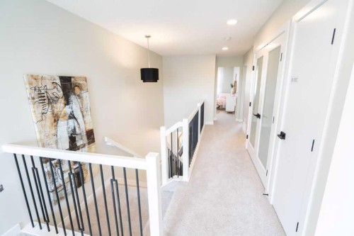 31 Heritage Heath, Cochrane, AB - Indoor Photo Showing Other Room