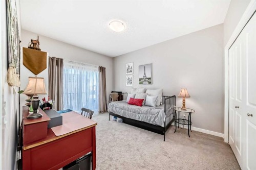 803-250 Fireside View, Cochrane, AB - Indoor Photo Showing Bedroom