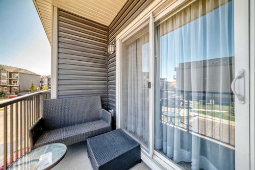 803-250 Fireside View, Cochrane, AB - Outdoor With Deck Patio Veranda With Exterior