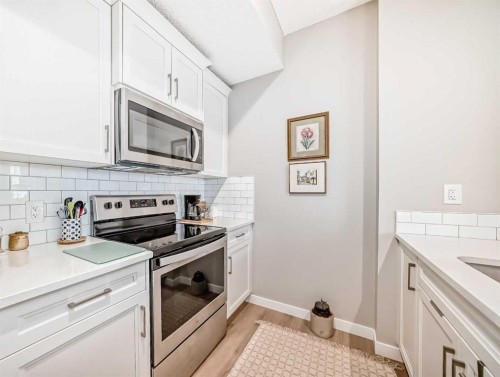 803-250 Fireside View, Cochrane, AB - Indoor Photo Showing Kitchen