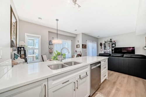 803-250 Fireside View, Cochrane, AB - Indoor Photo Showing Kitchen With Double Sink