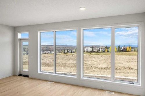 46 Heritage Heath, Cochrane, AB - Indoor Photo Showing Other Room