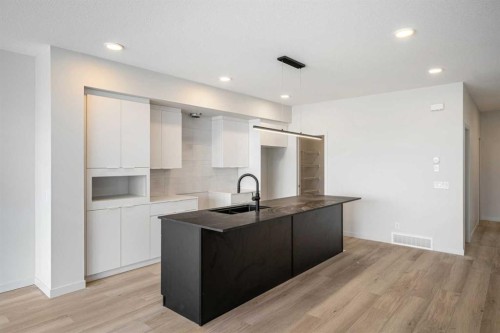 46 Heritage Heath, Cochrane, AB - Indoor Photo Showing Kitchen