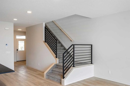 46 Heritage Heath, Cochrane, AB - Indoor Photo Showing Other Room