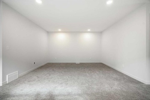 46 Heritage Heath, Cochrane, AB - Indoor Photo Showing Other Room