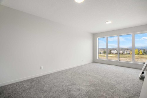 46 Heritage Heath, Cochrane, AB - Indoor Photo Showing Other Room