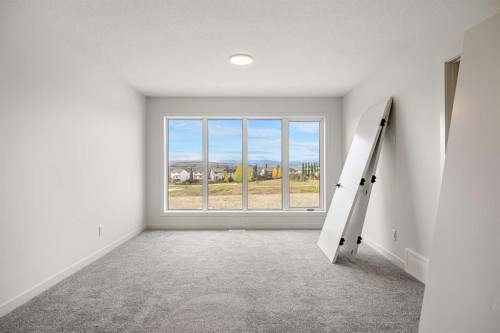 46 Heritage Heath, Cochrane, AB - Indoor Photo Showing Other Room